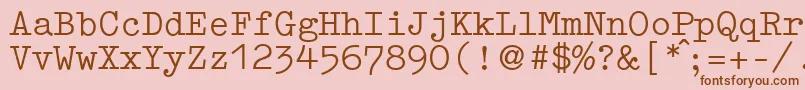 フォントGermantypewriterRegular – ピンクの背景に茶色のフォント