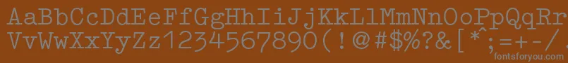 fuente GermantypewriterRegular – Fuentes Grises Sobre Fondo Marrón