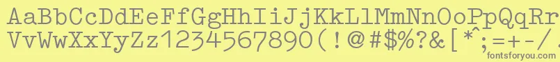 fuente GermantypewriterRegular – Fuentes Grises Sobre Fondo Amarillo