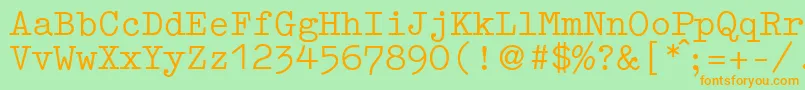 フォントGermantypewriterRegular – オレンジの文字が緑の背景にあります。