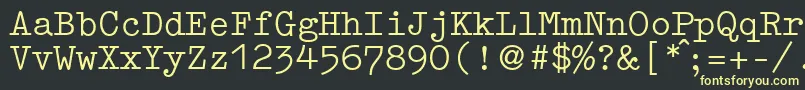 Fonte GermantypewriterRegular – fontes amarelas em um fundo preto