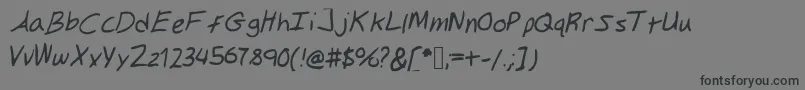 Gilkeynotes Font – Black Fonts on Gray Background