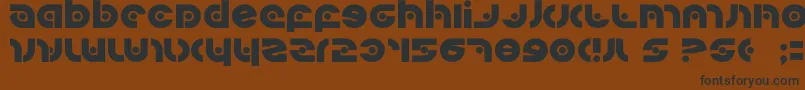 Kovacssp-fontti – mustat fontit ruskealla taustalla
