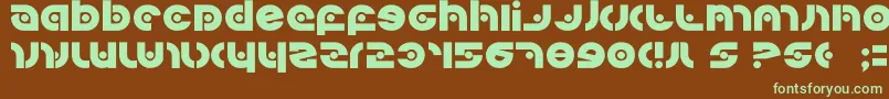 フォントKovacssp – 緑色の文字が茶色の背景にあります。