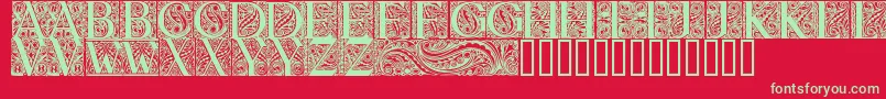 BehrensAntiquaInitialen-fontti – vihreät fontit punaisella taustalla