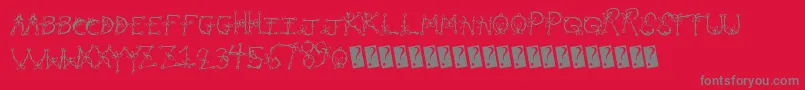 Fonte Planttype – fontes cinzas em um fundo vermelho