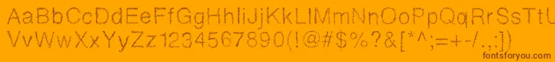 Drawveticamini Font – Brown Fonts on Orange Background