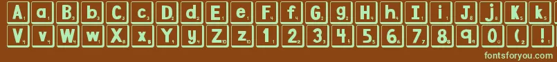 フォントDjbLetterGameTiles2 – 緑色の文字が茶色の背景にあります。