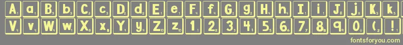 DjbLetterGameTiles2 Font – Yellow Fonts on Gray Background