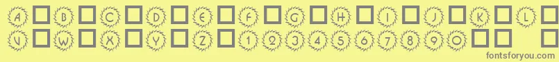 101DecoType1-fontti – harmaat kirjasimet keltaisella taustalla