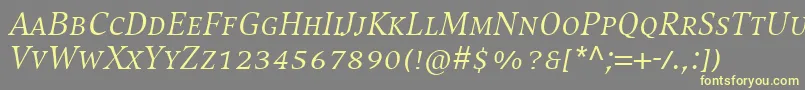 CompatilExquisitLtComItalicSmallCaps Font – Yellow Fonts on Gray Background