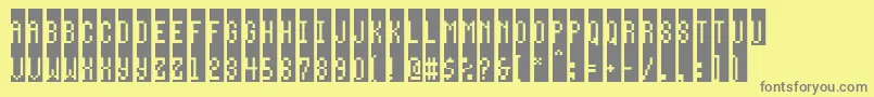 Way-fontti – harmaat kirjasimet keltaisella taustalla