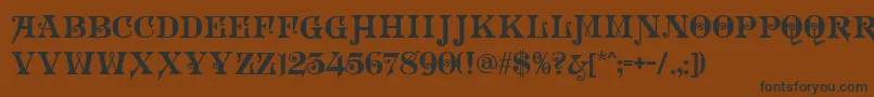 フォントLiveroyDecor – 黒い文字が茶色の背景にあります