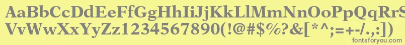 フォントNewasterltstdBold – 黄色の背景に灰色の文字