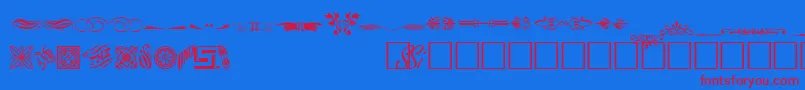 WoodcutornamentstwosskRegular Font – Red Fonts on Blue Background