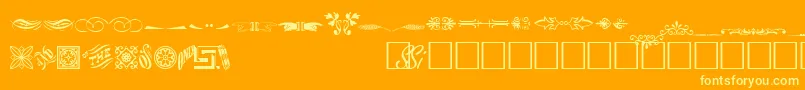 Fonte WoodcutornamentstwosskRegular – fontes amarelas em um fundo laranja