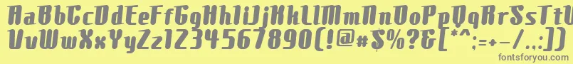 フォントComonsExtrabold – 黄色の背景に灰色の文字