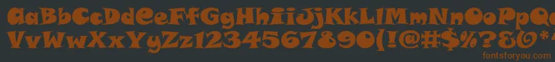 SnapAltItcTt-fontti – ruskeat fontit mustalla taustalla