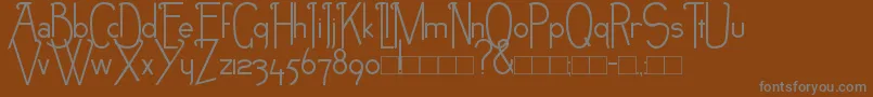 NEB-fontti – harmaat kirjasimet ruskealla taustalla