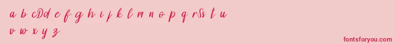 DollynDemo-fontti – punaiset fontit vaaleanpunaisella taustalla
