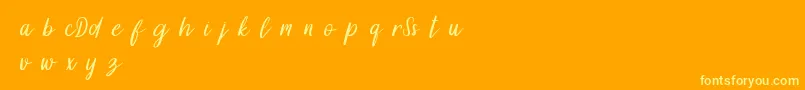 DollynDemo-Schriftart – Gelbe Schriften auf orangefarbenem Hintergrund
