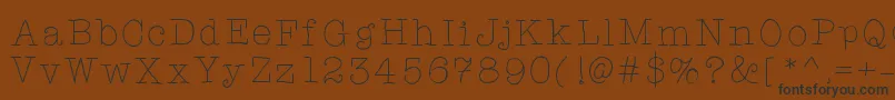 Tarjustamonday-fontti – mustat fontit ruskealla taustalla