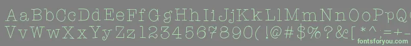 Tarjustamonday-Schriftart – Grüne Schriften auf grauem Hintergrund