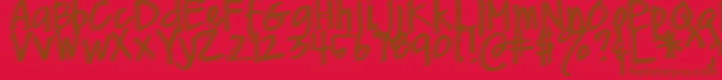 Fonte DjbMeAndMyShadow – fontes marrons em um fundo vermelho