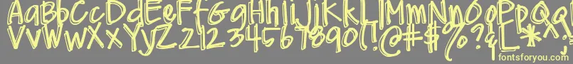 DjbMeAndMyShadow Font – Yellow Fonts on Gray Background
