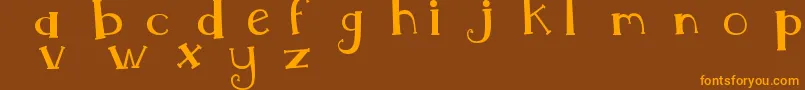 フォントMtfWhimsy – オレンジ色の文字が茶色の背景にあります。