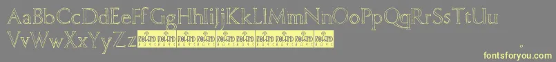 FreehandRoman-Schriftart – Gelbe Schriften auf grauem Hintergrund
