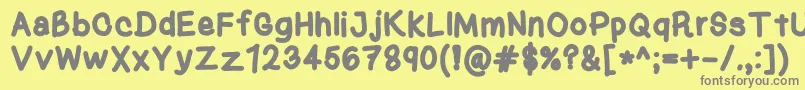 フォントKasukiHandBold – 黄色の背景に灰色の文字