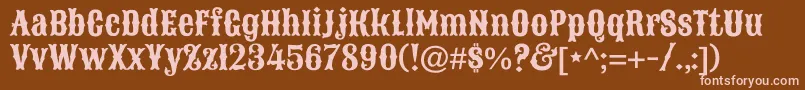 SancreekRegular Font – Pink Fonts on Brown Background