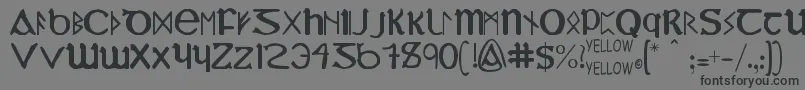 YyUncialMostIrish Font – Black Fonts on Gray Background