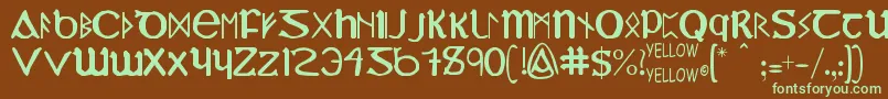 フォントYyUncialMostIrish – 緑色の文字が茶色の背景にあります。