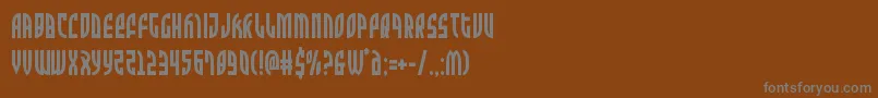 Zoneridercond-fontti – harmaat kirjasimet ruskealla taustalla