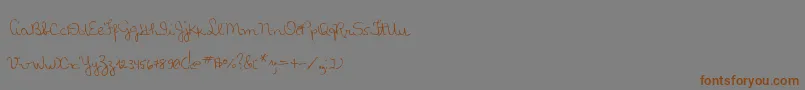 MtfLolisHandwriting Font – Brown Fonts on Gray Background