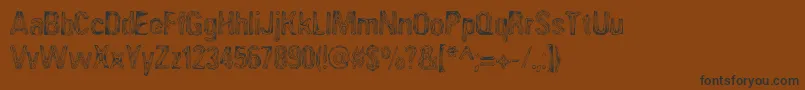AngiomaAoe-Schriftart – Schwarze Schriften auf braunem Hintergrund