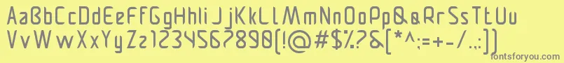 Pamekasanr-Schriftart – Graue Schriften auf gelbem Hintergrund