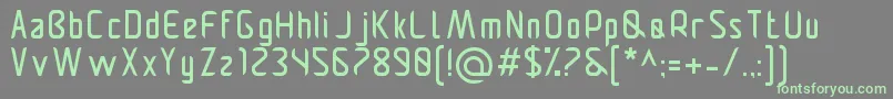 Pamekasanr-Schriftart – Grüne Schriften auf grauem Hintergrund