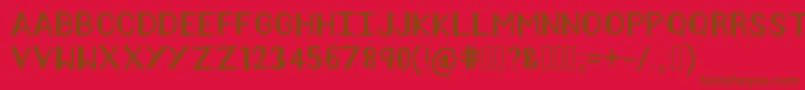 AmeliaPond-fontti – ruskeat fontit punaisella taustalla