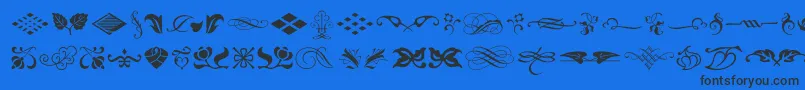 TypeEmbellishmentsOneLetPlain.1.0-Schriftart – Schwarze Schriften auf blauem Hintergrund