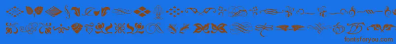 Fonte TypeEmbellishmentsOneLetPlain.1.0 – fontes marrons em um fundo azul