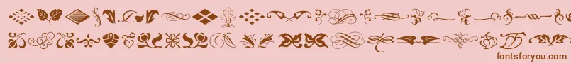 フォントTypeEmbellishmentsOneLetPlain.1.0 – ピンクの背景に茶色のフォント