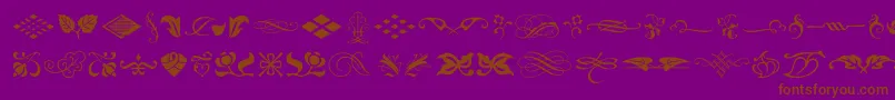 フォントTypeEmbellishmentsOneLetPlain.1.0 – 紫色の背景に茶色のフォント