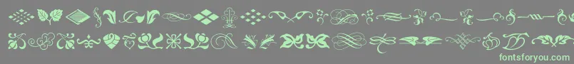 フォントTypeEmbellishmentsOneLetPlain.1.0 – 灰色の背景に緑のフォント