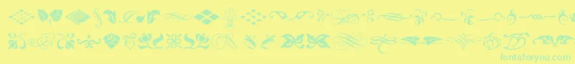 TypeEmbellishmentsOneLetPlain.1.0 Font – Green Fonts on Yellow Background