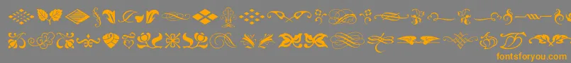 Подробнее о шрифте TypeEmbellishmentsOneLetPlain.1.0 Шрифт TypeEmbellishmentsOneLetPlain.1.0 – оранжевые шрифты на сером фоне