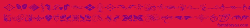 fuente TypeEmbellishmentsOneLetPlain.1.0 – Fuentes Moradas Sobre Fondo Rojo