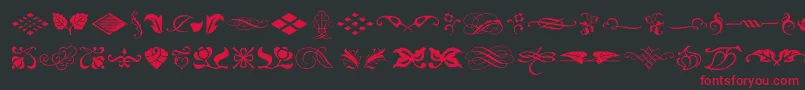 TypeEmbellishmentsOneLetPlain.1.0 Font – Red Fonts on Black Background